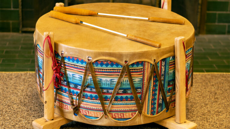 Native drum with sticks.