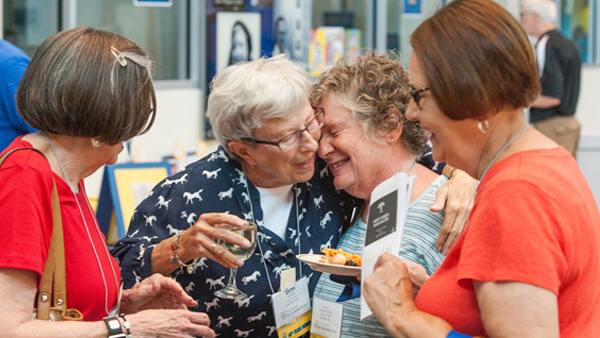 St. Scholastica alumni embracing