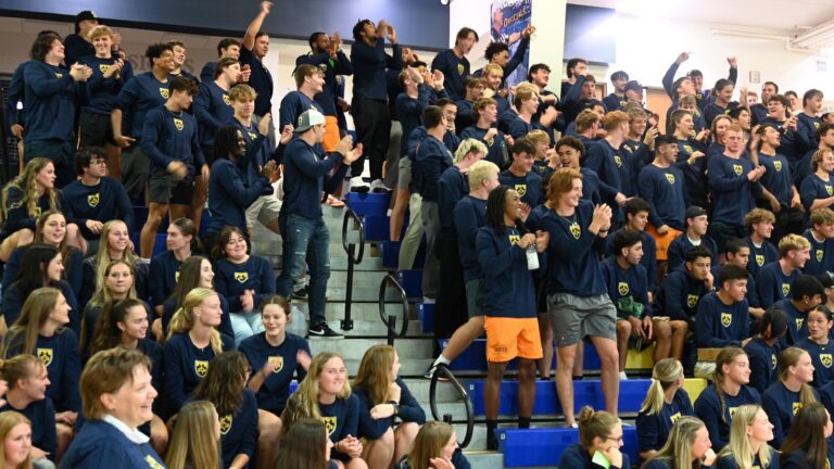 St. Scholastica students cheer on their fellow athletes.