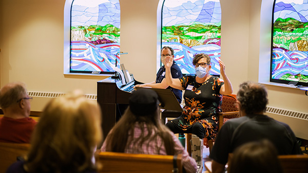 Beth Kaiser directs the Victory Choir