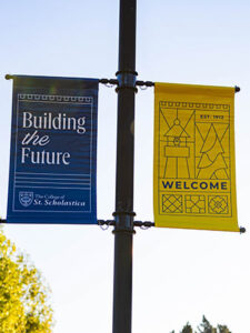 Photo of St. Scholastica campus banners featuring the new brand.