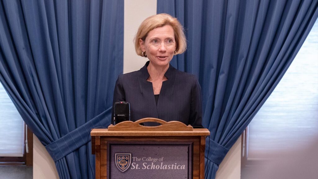 Photo of St. Scholastica president, Brenda Kelly giving a speech.