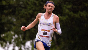 Junior Nathan Neu runs cross country