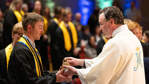 Dave Gunnarson at St. Scholastica's Commencement Mass