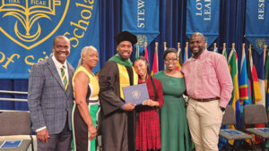 Duvaughn Dick and his family at commencement.