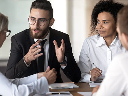 Anti-bias search team in a discussion.