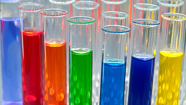 Test tubes filled a variety of colored liquids.