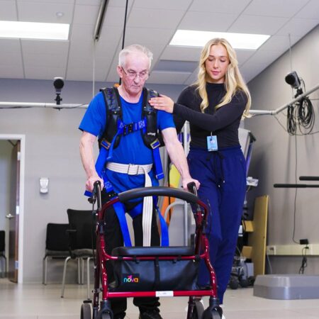 St. Scholastica PT student works with Maurice's Community Clinic patient.