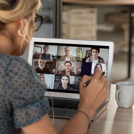 Photo of woman engaging with a Zoom class