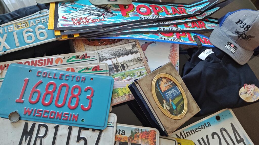 An assortment of Poplar, Minnesota, and Wisconsin themed items