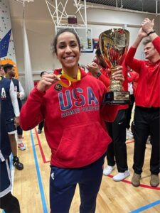 Briana Allen celebrates a win with the US Armed Forces Women's Basketball Team