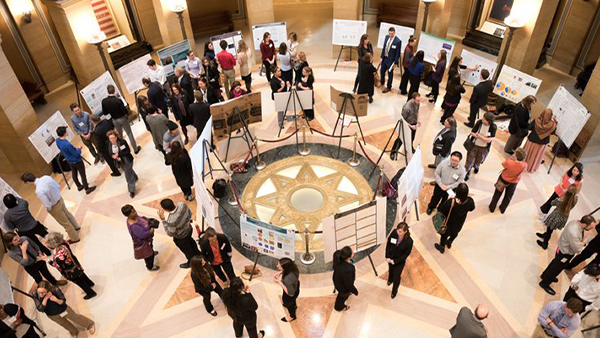 Scholars presenting their projects at the capitol.