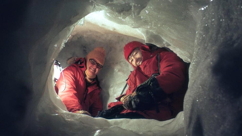 Sr. Mary and Dr. Mary Alice McWhinnie in ice cave near the Ross Ice Shelf