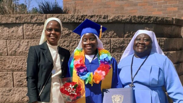 Photo of Sister Agnes Atai after graduating from her nursing program with Sister Chairty Nkwera and Sister Sylvia.
