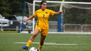 Senior Karissa Beaston playing soccer