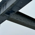 Photo of the signed beam put in place in the new student center