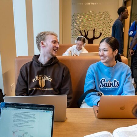 Students gathered at a table in the St. Scholastica Student Center.