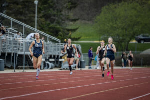 Junior Mia Case and Sophomore Jaden Ellefson pictured for Saints Track & Field