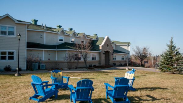 Seating area outside of St. Scholastica's Cedar Apartments.