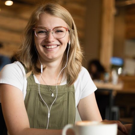 Student studying in a coffee shop.