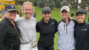 Rognerud, center, and her colleagues from Ascential Wealth during the inaugural Bridging the Gap run on Oct. 2, 2021.