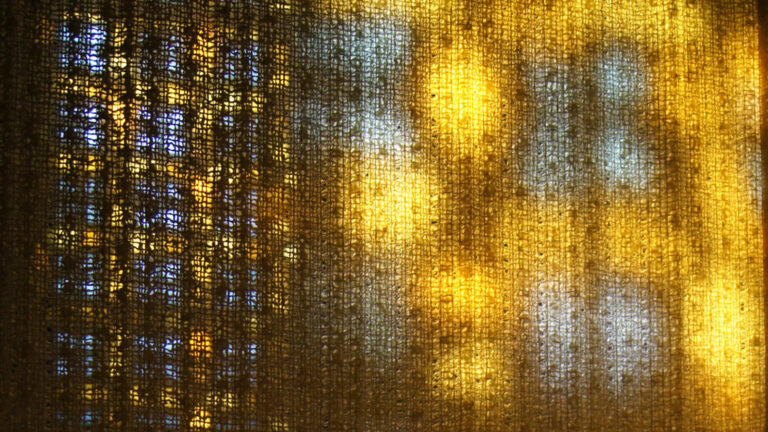 Stained Glass Window with Light Shining Through