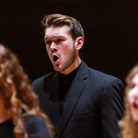 St. Scholastica students singing in a choir concert.