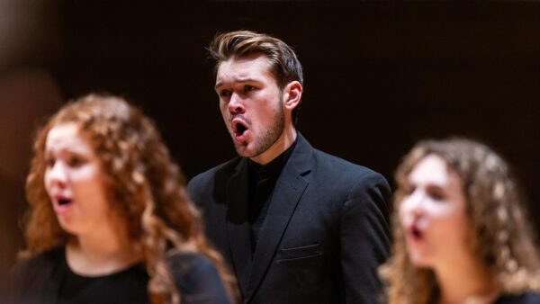St. Scholastica students singing in a choir concert.