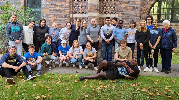 Community Day volunteer group in the courtyard on the Duluth campus.