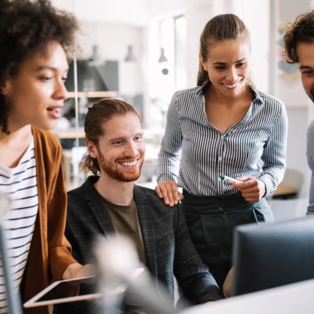 Professionals working in an office setting.