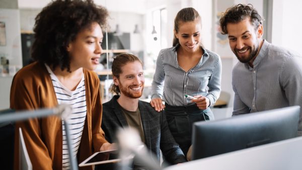 Professionals working in an office setting.