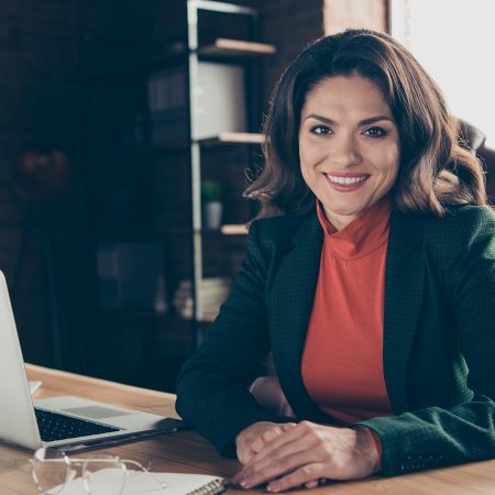 Education professional working at a desk.