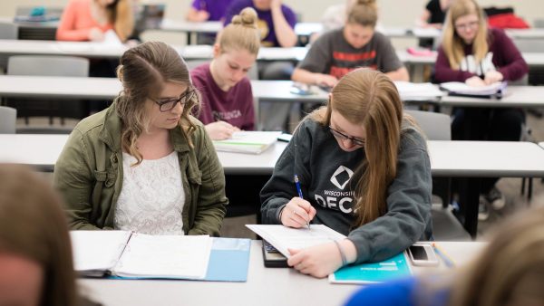 Classroom full of students during a class at St. Scholastica.