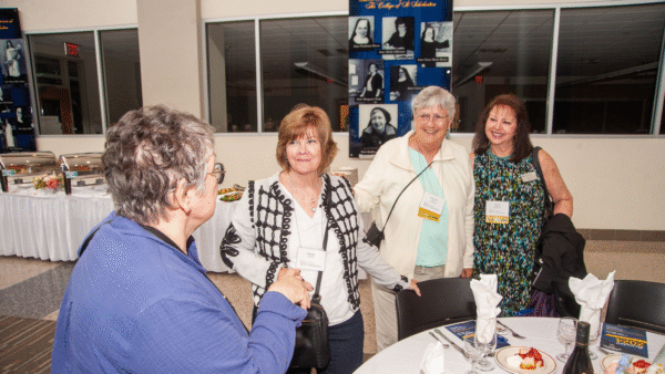 Four alumni gathered for Alumni Reunion 2024.