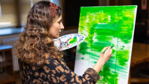 St. Scholastica student Halima Amiri painting.