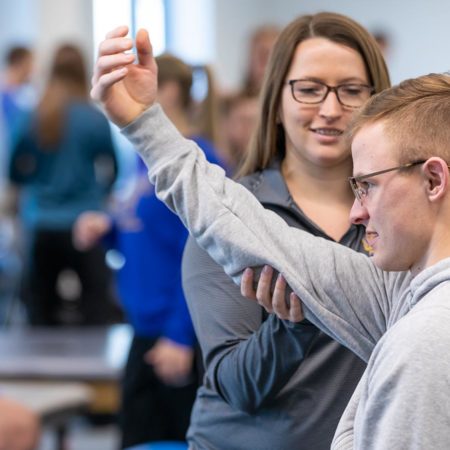 Students practicing techniques in the Mat Lab at the Health Science Center.