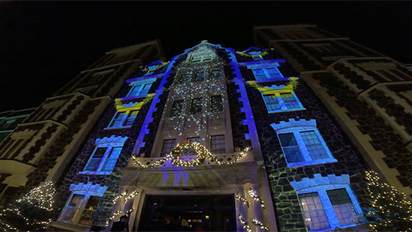 The main entrance of Tower Hall lit up in during the Holiday Season.
