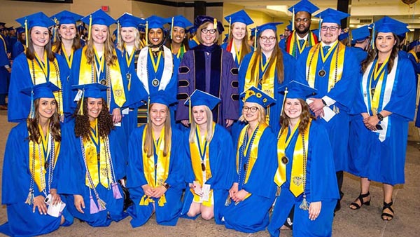 Group of Honors Program Graduates with Director Stephanie Johnson, PhD.