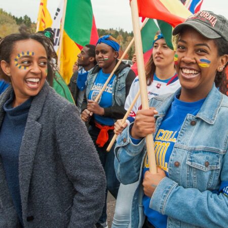 International students participating in the Homecoming parade.