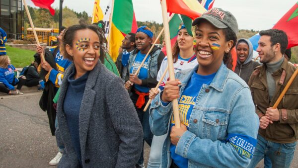 International students participating in the Homecoming parade.