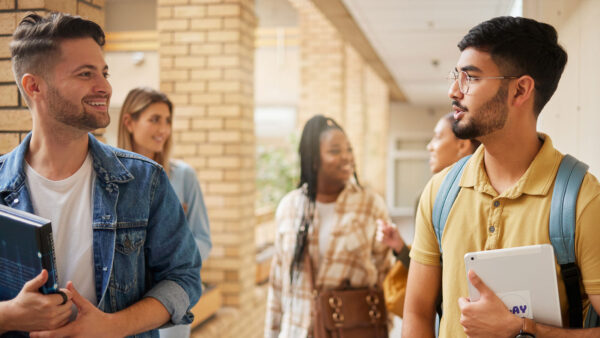 International students walking on a campus.