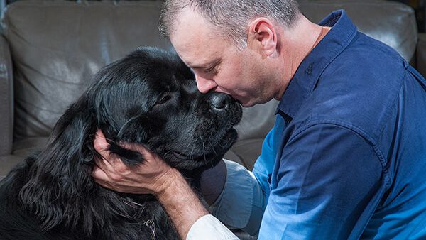 Jack Lee and his certified therapy dog Nova