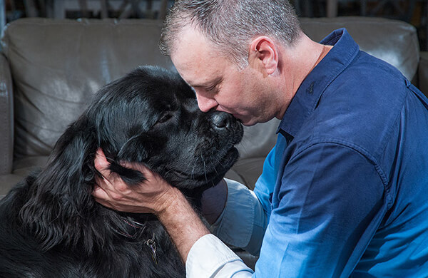 Jack Lee and his certified therapy dog Nova