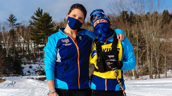 Kristen Bourne and Maria Stuber at a skiing event.