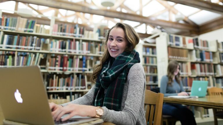 Students studying in the St. Scholastica Library