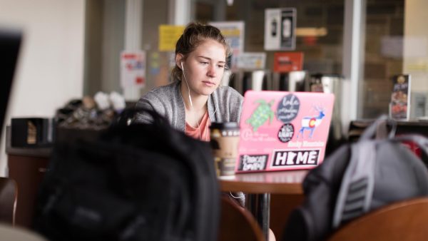 Student studying in Einstein's at St. Scholastica.