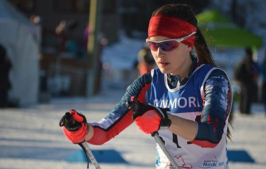 Mia Zutter skiing at Canmore at the IPC Cross-Country Skiing and Biathlon World Cup