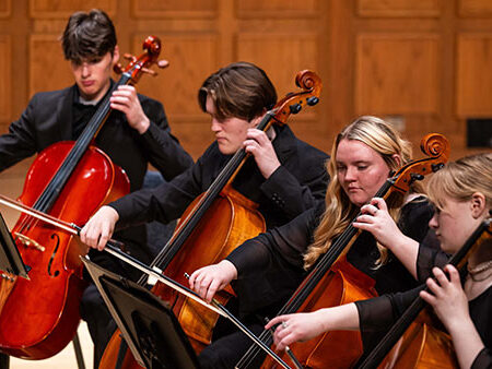 A group of St. Scholastica musicians performing in the Mitchell Auditorium on the Duluth main campus.