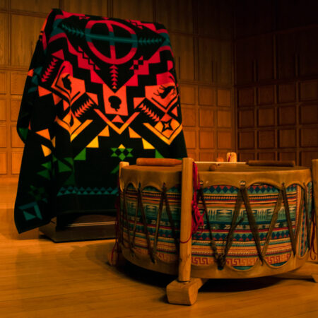 Native drum and blanket.