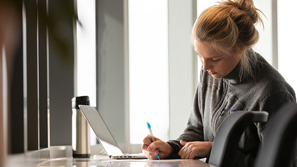 St. Scholastica student studying in the Health Science Center.